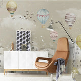 Whimsical Air Balloons Flying Nursery Wallpaper