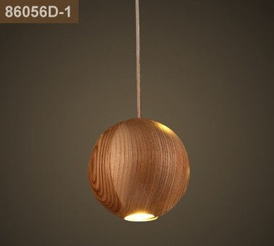 Suspension globe en bois : éclairage élégant