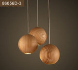 Suspension globe en bois : éclairage élégant